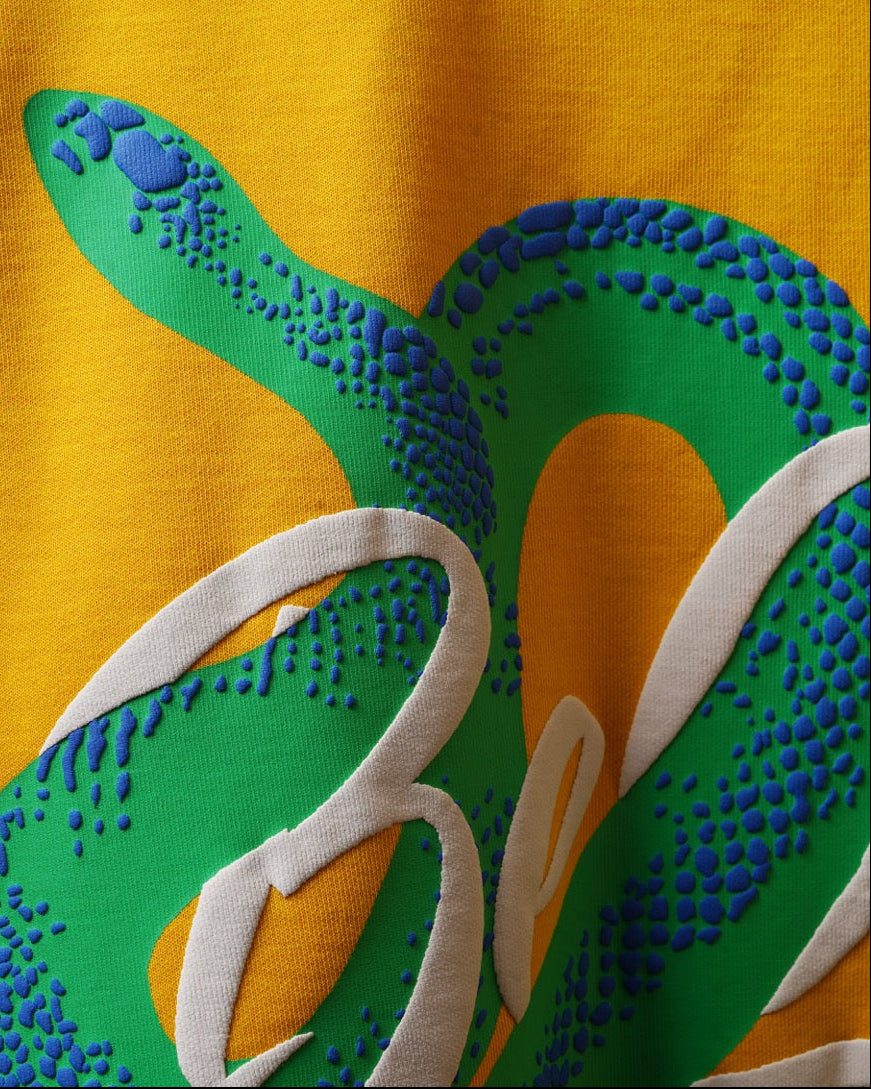 Hiss & Twist Tee - Gold Fusion